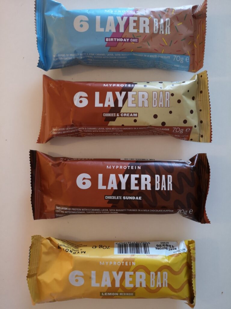 Op deze foto zie je 4 smaken van de 6 layer bar