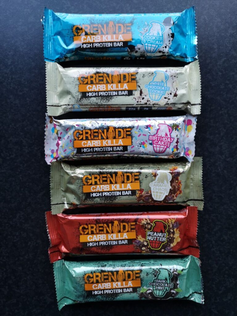Op deze foto zie je 6 smaken van de Carb Killa Bars 