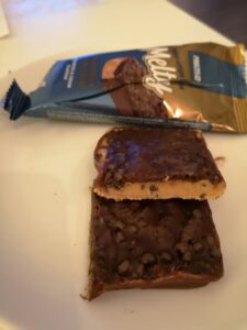 Op deze foto zie je de smaak Cookies & 
Cream van de melty bar